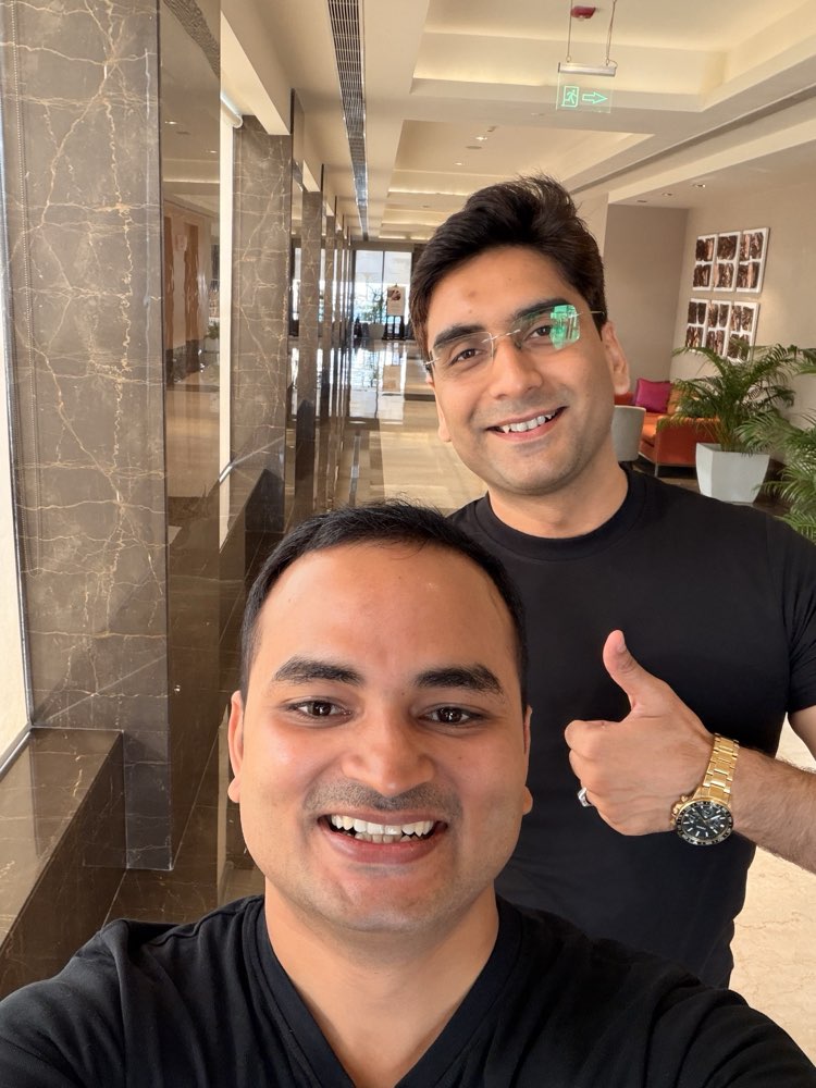 Akshay Mishra with a peer at an event